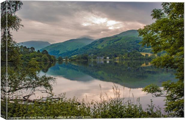 Reflections at Grasmere in the Lake District Canvas Print by Richard Perks