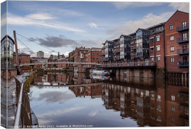 Leeds Millenium bridge reflections Canvas Print by Richard Perks