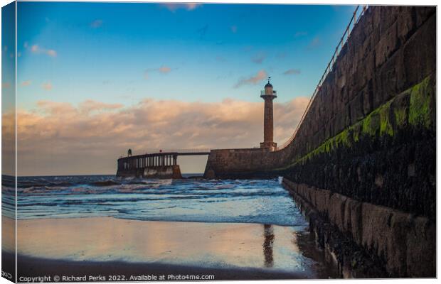 Whitby Pier reflections Canvas Print by Richard Perks