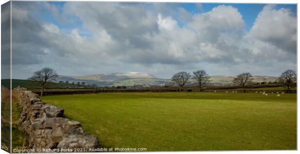 A dusting of Snow on Pendle Hill Canvas Print by Richard Perks