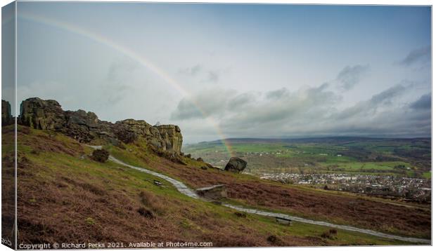 Rainbow over the Cow and Calf, Ilkley Moor Canvas Print by Richard Perks