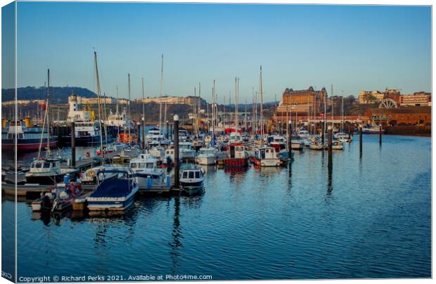 Scarborough Harbour reflections Canvas Print by Richard Perks