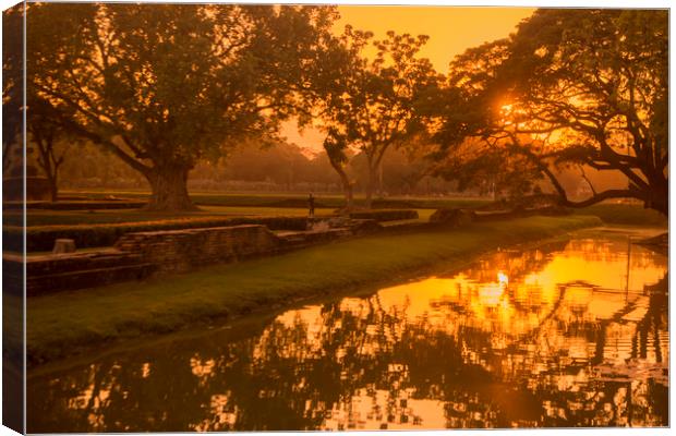 ASIA THAILAND SUKHOTHAI WAT MAHATHAT SUNSET Canvas Print by urs flueeler