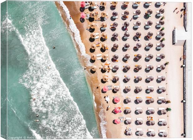 Ocean Print, Beach Umbrellas Print Canvas Print by Radu Bercan