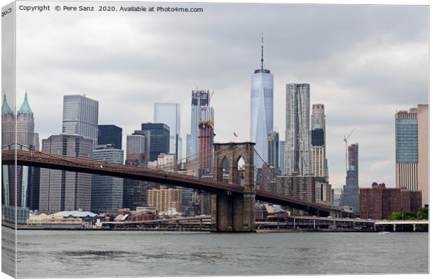 Lower Manhattan Skyline and Brooklyn Bridge Panora Canvas Print by Pere Sanz
