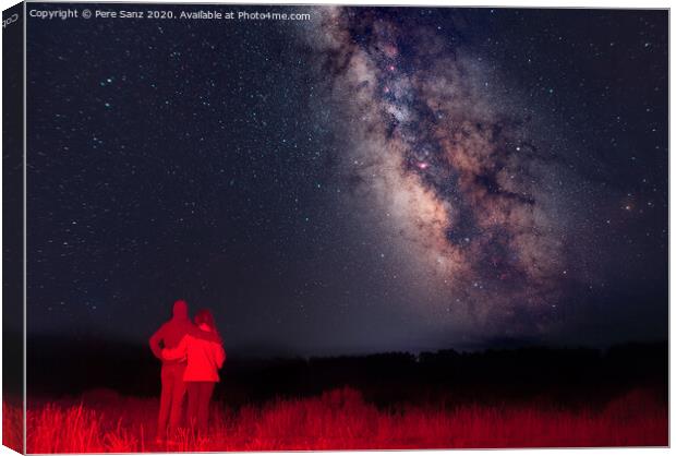 Couple looking at the milky way Canvas Print by Pere Sanz