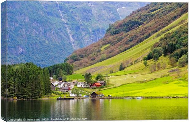 Small village at the banks of the Aurlandsfjord in Norway Canvas Print by Pere Sanz