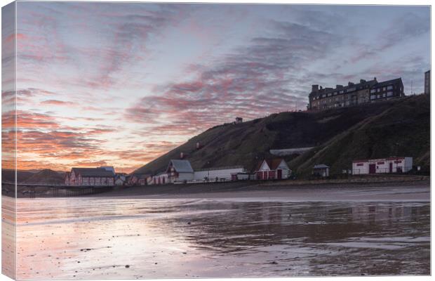 Fiery sunrise over saltburn Canvas Print by Kevin Winter
