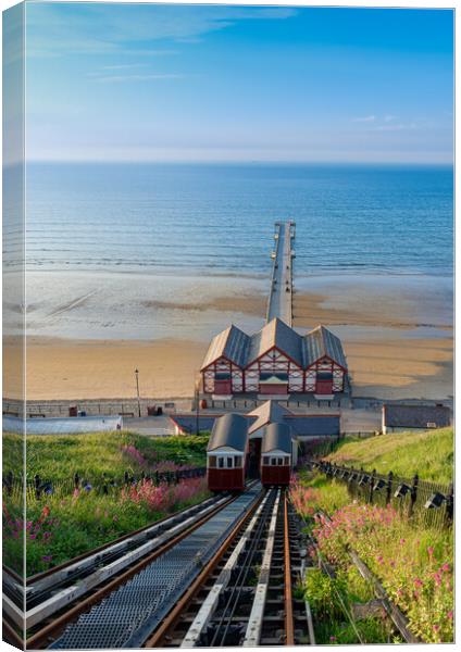 Saltburn cliff lift and pier Canvas Print by Kevin Winter