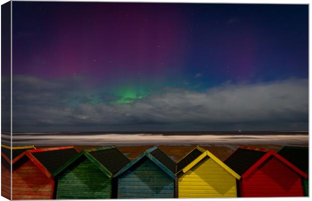 Aurora beach huts Canvas Print by Kevin Winter