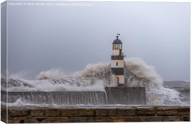 Battered by Waves Canvas Print by Kevin Winter