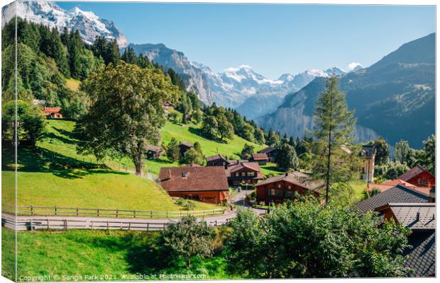 Swiss Wengen village and alps mountain Canvas Print by Sanga Park