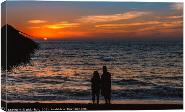 Remember when - a couple in silhouette share a moment, sand, sea and setting sun Canvas Print by Blok Photo 