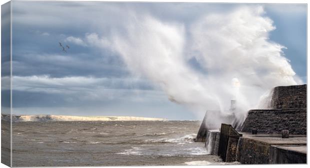Porthcawl Lighthouse during Storm Canvas Print by Roger Daniel