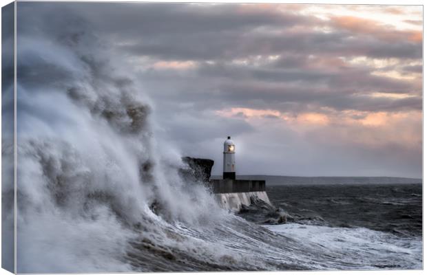Porthcawl Lighthouse during Storm Canvas Print by Roger Daniel