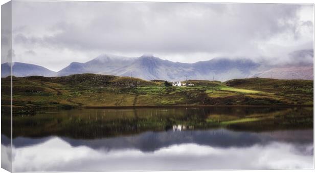 Skye and Loch Canvas Print by Roger Daniel