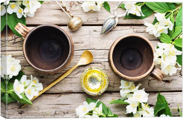 Jasmine tea with jasmine flower Canvas Print by Mykola Lunov Mykola
