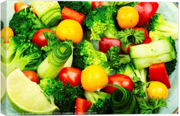 Fresh colorful vegetarian salad, close up Canvas Print by Mykola Lunov Mykola