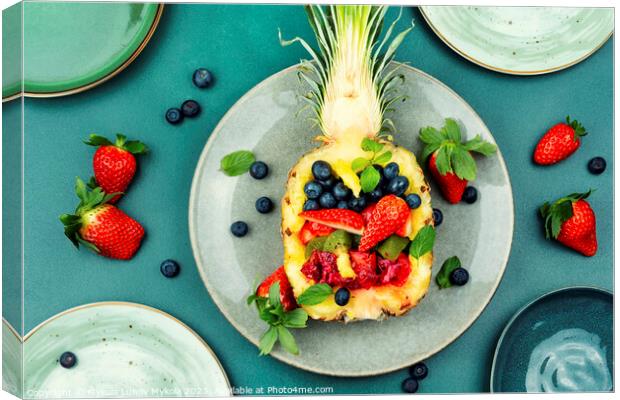 Fruit salad in half a pineapple. Canvas Print by Mykola Lunov Mykola