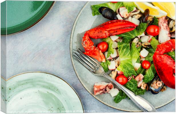 Seafood salad on a plate Canvas Print by Mykola Lunov Mykola