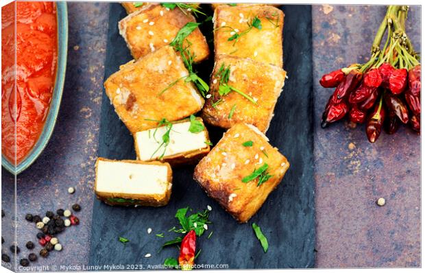 Yummy tofu cheese roasted with sesame Canvas Print by Mykola Lunov Mykola