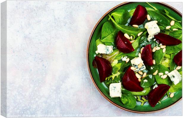 Vegetable salad with beets, cheese and herbs. Canvas Print by Mykola Lunov Mykola