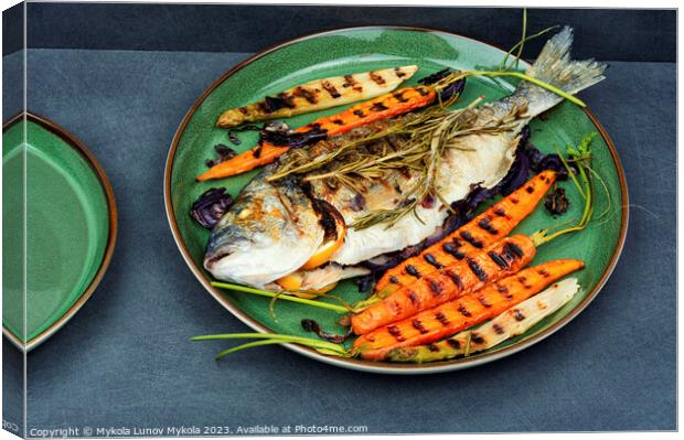 Roasted dorado fish on a plate Canvas Print by Mykola Lunov Mykola