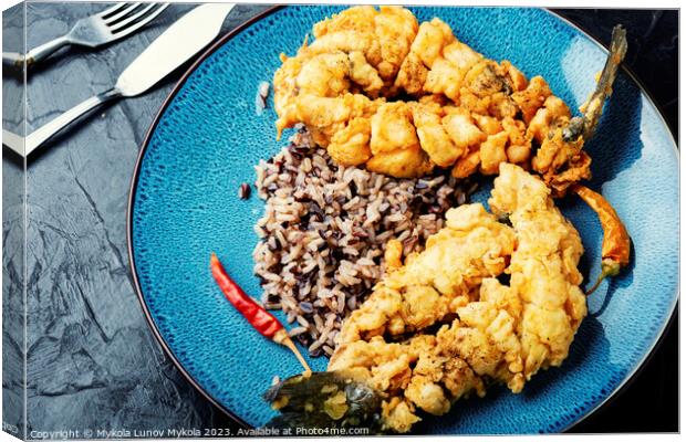 Breaded fish and rice on the plate. Canvas Print by Mykola Lunov Mykola