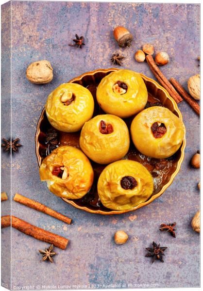 Baked autumn apples with nuts and raisins Canvas Print by Mykola Lunov Mykola