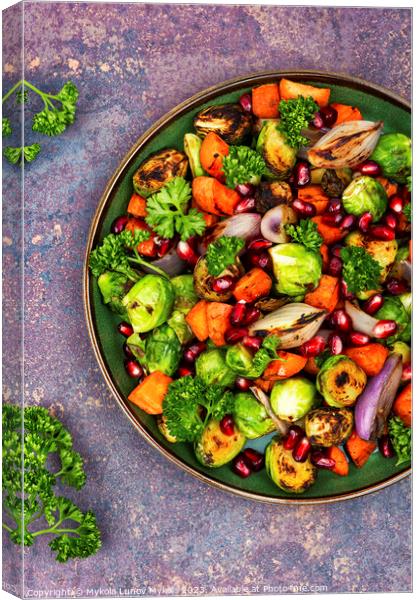 Bright vegetable salad on the table. Canvas Print by Mykola Lunov Mykola