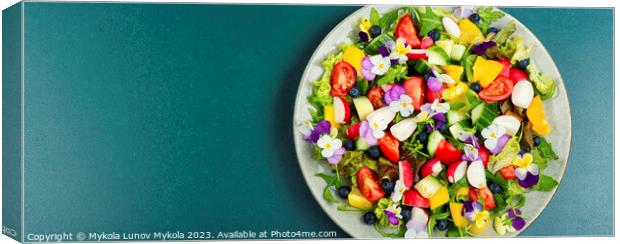 Summer salad with edible flowers,space for text. Canvas Print by Mykola Lunov Mykola