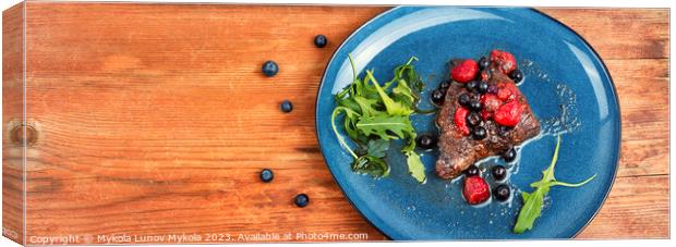 Beef steak in berry sauce on plate. Canvas Print by Mykola Lunov Mykola