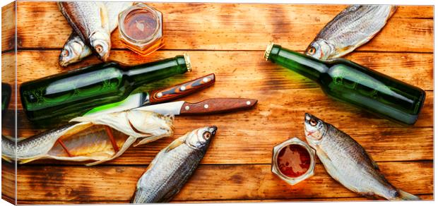 Dried fish and beer Canvas Print by Mykola Lunov Mykola