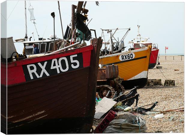 Fishing boats on the shore in Hastings Canvas Print by David French