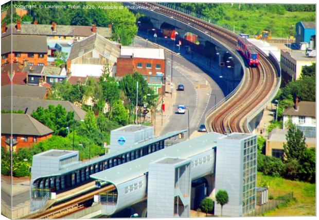 Docklands Light Railway, London Canvas Print by Laurence Tobin