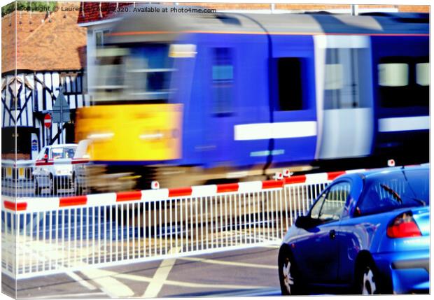 Fast Train on Level Crossing Canvas Print by Laurence Tobin