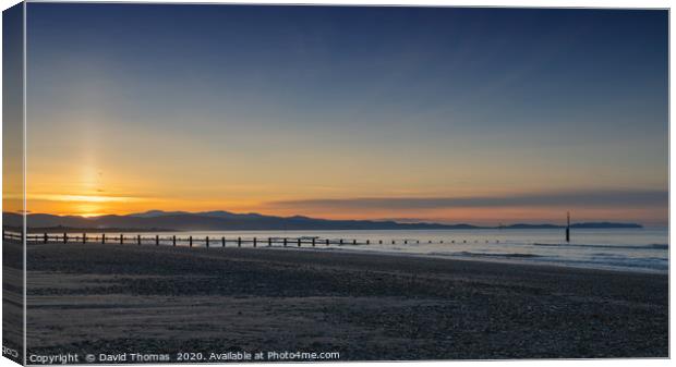 Glowing Rhyl Sunset Canvas Print by David Thomas