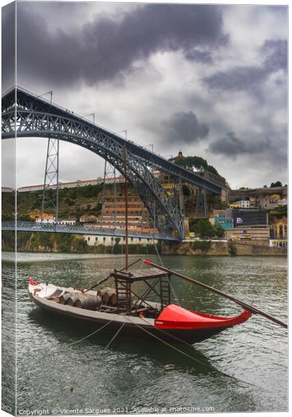 Boat and bridge Canvas Print by Vicente Sargues