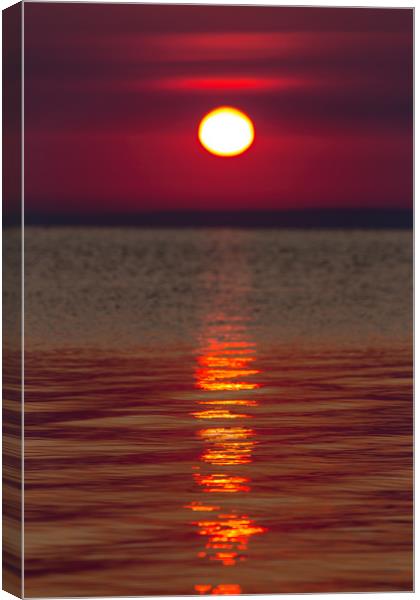 Sunrise light over the lake Canvas Print by Arpad Radoczy