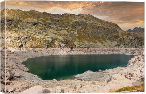 Mountain lake Canvas Print by Arpad Radoczy