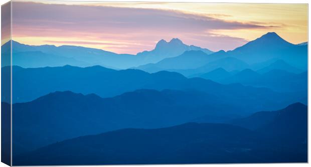 Sunset light over the spanish Pyrenees mountains Canvas Print by Arpad Radoczy