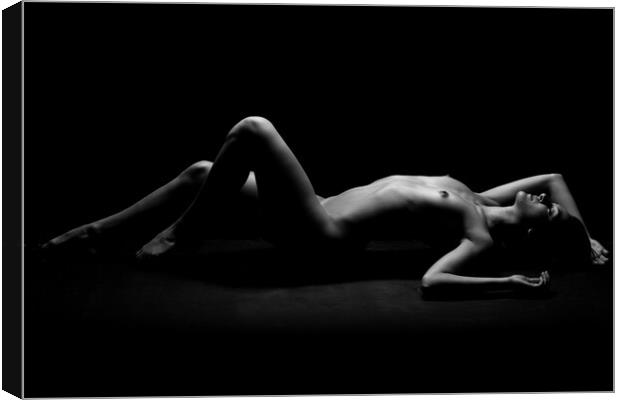 Nude woman fine art naked lying sleeping on black Canvas Print by Alessandro Della Torre