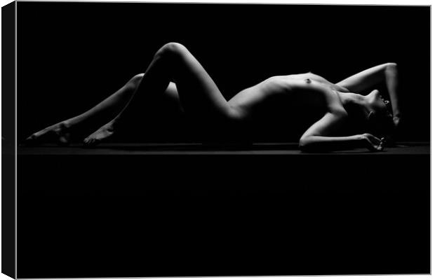 Nude woman fine art naked lying sleeping on black Canvas Print by Alessandro Della Torre