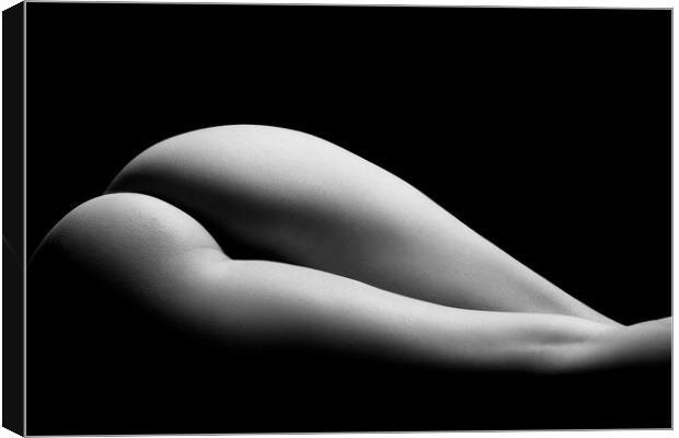 ass of a woman naked in fine art photography bodyscape laying on black studio background Canvas Print by Alessandro Della Torre
