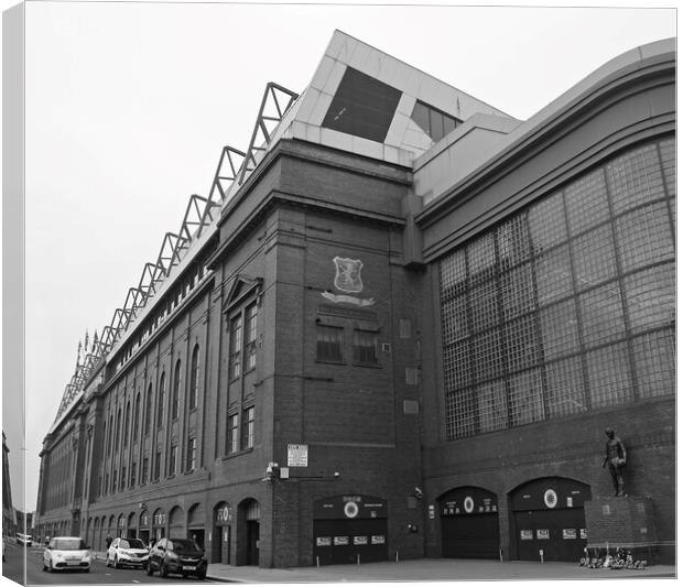 Ibrox main stand and memorial statue Canvas Print by Allan Durward Photography