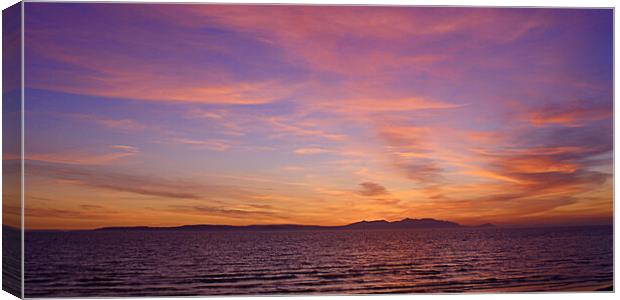 Arran and a colourful sky at dusk Canvas Print by Allan Durward Photography