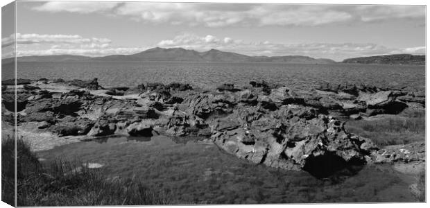 Isle of Arran and Portencross rocks monochrome Canvas Print by Allan Durward Photography