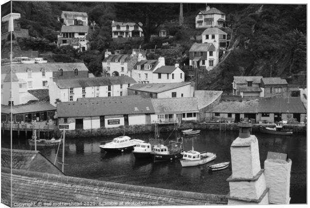 Fishing boats shelter in Polperro Harbour Canvas Print by Neil Mottershead