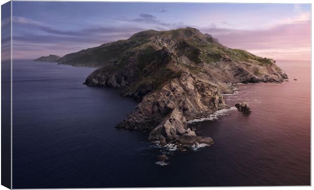 A rocky island in the middle of a body of water Canvas Print by Omar Al-Ashi
