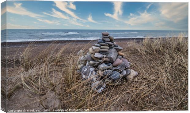 Stone cairn at Lildstrand beach in western rural Denmark Canvas Print by Frank Bach